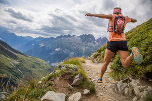 Hilary McCloy trail running in Chamonix in her HOKA Speedgoat shoes